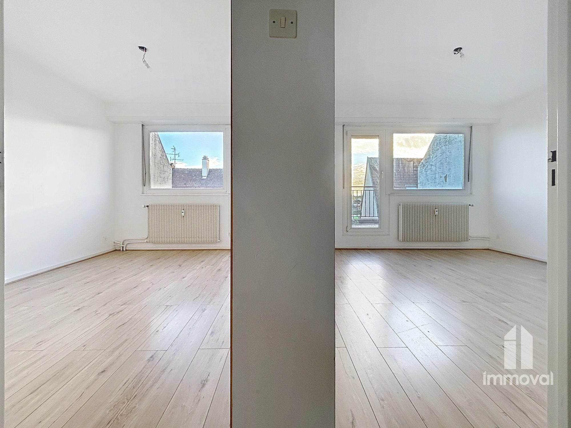 Neudorf, deux-pièces en attique avec 35 m² de terrasse.